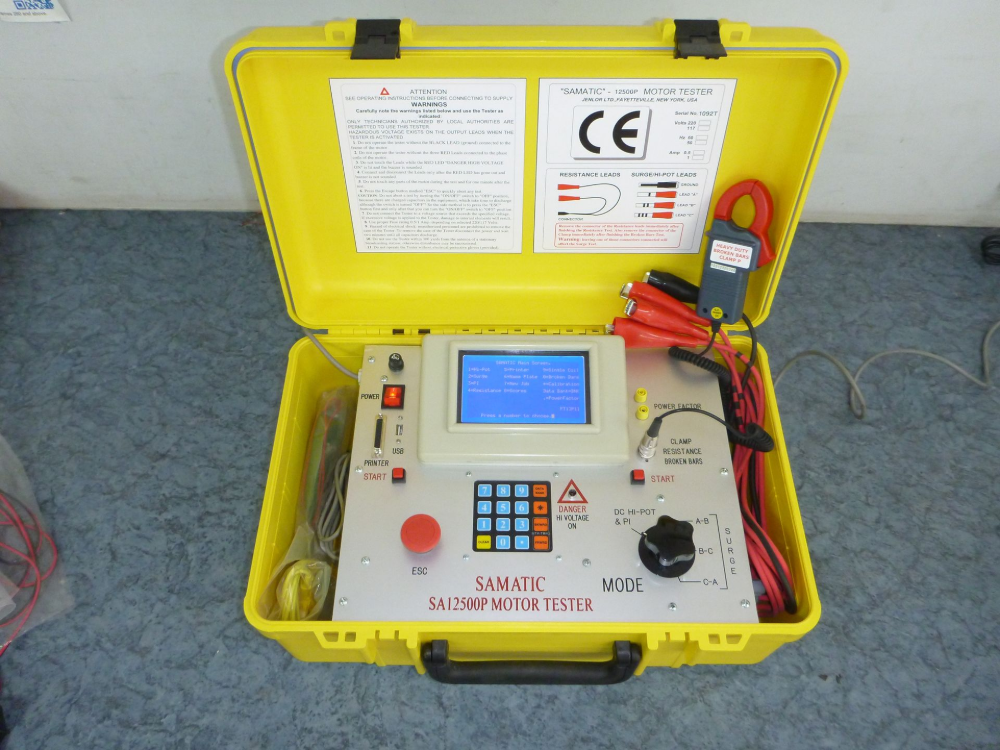Yellow electrical testing kit with a screen and cables open on a table.— Davidson's Electrical In Mackay, QLD