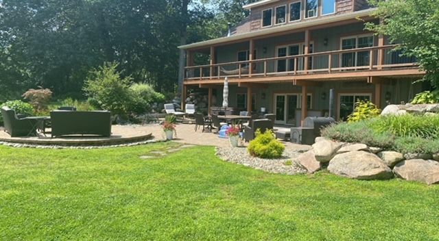 residential home with landscaped yard