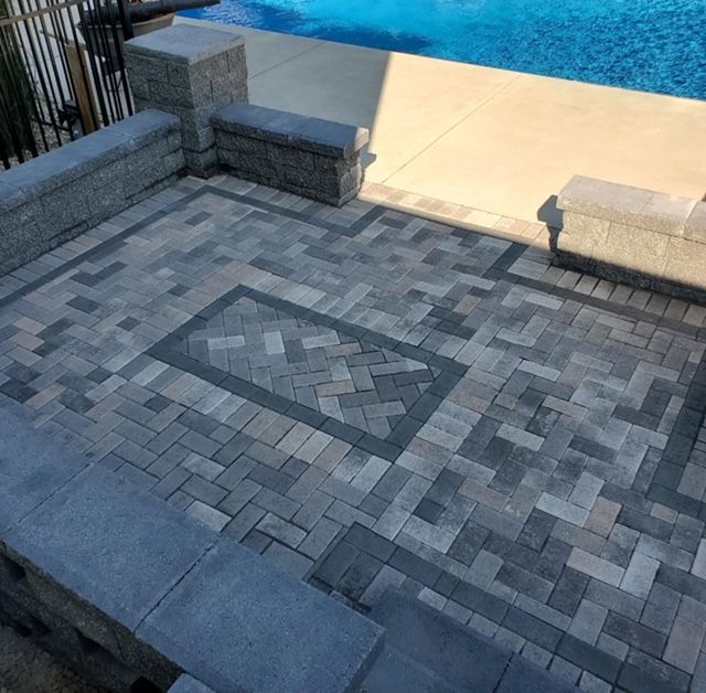 pavers outside of backyard pool