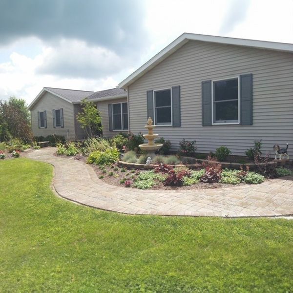 residential home with landscaped yard