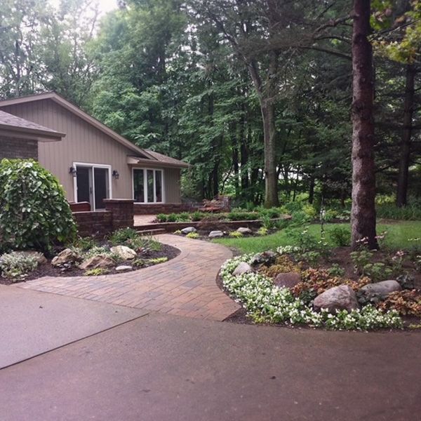 residential home with landscaped yard