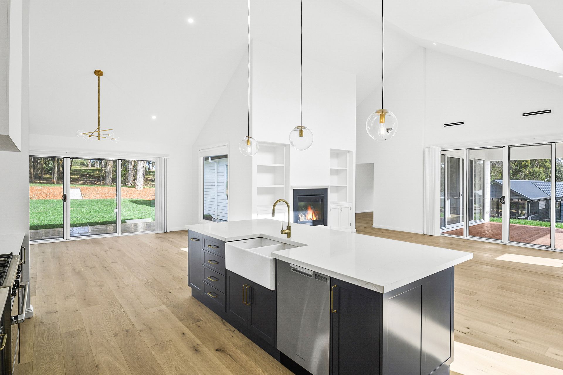 There is a large island in the middle of the kitchen.