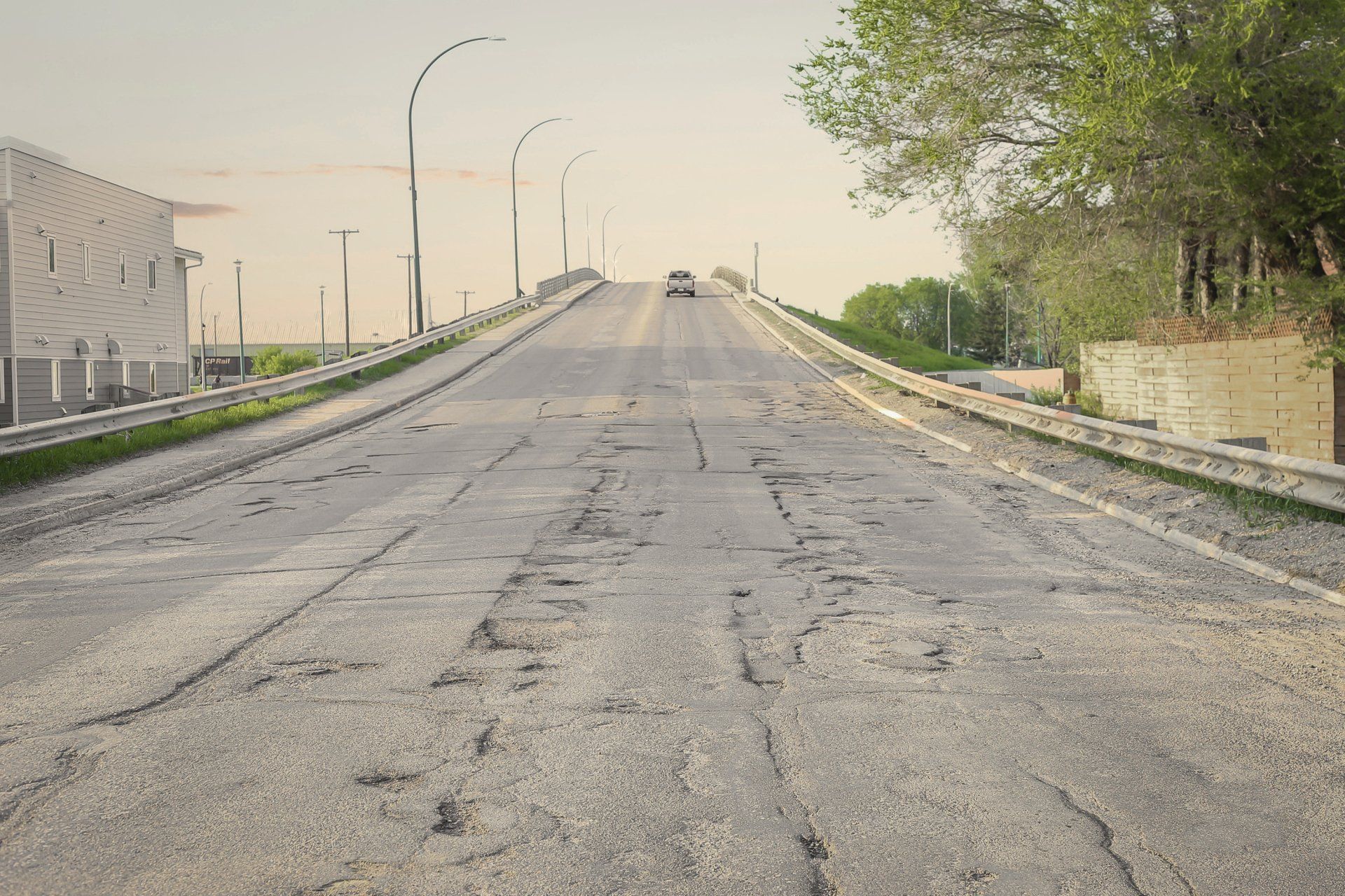 Uphill Filled with Potholes — Barrie, ON — SprayMan Group