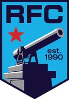 RFC logo with red star and cannon on blue shield, labeled &ldquo;est. 1990&rdquo;
