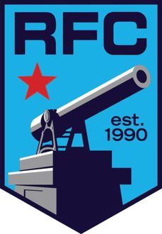 RFC logo with red star and cannon on blue shield, labeled &ldquo;est. 1990&rdquo;