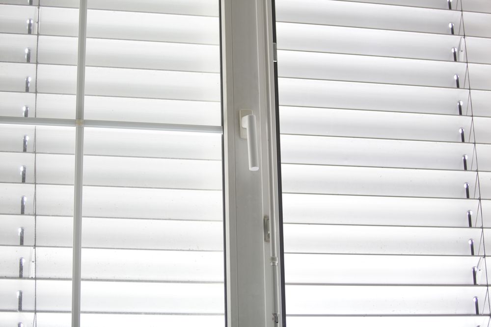 A Close Up of a Window With Blinds on It — Lismore Blinds in Ballina, NSW