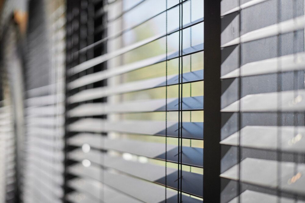 A Close Up of a Window With Blinds on It — Lismore Blinds in Byron Bay, NSW