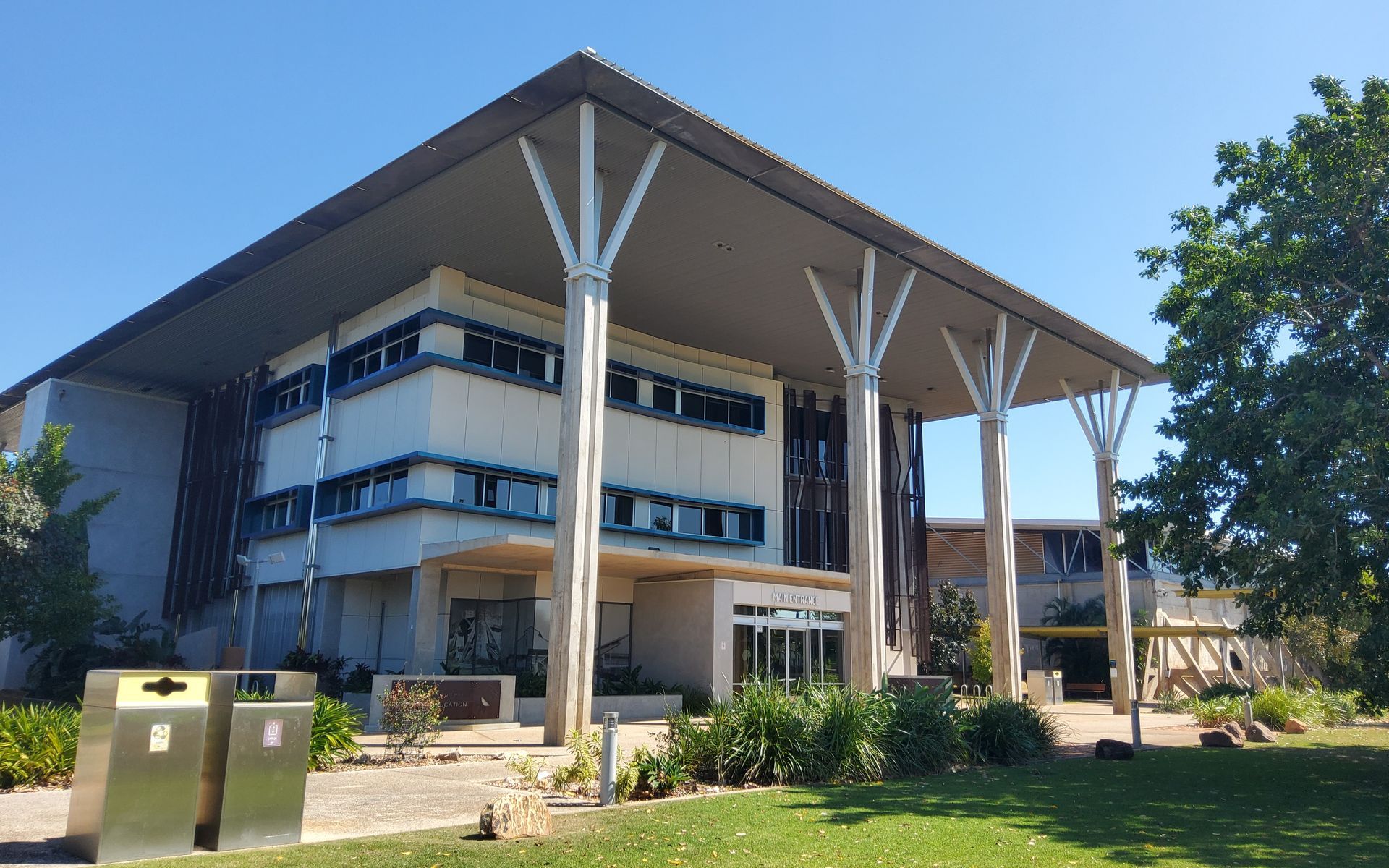 Three-Story Building with A Large Overhanging Roof — EXPOSURE NORTH PLASTERING PTY LTD in Berry Springs, NT