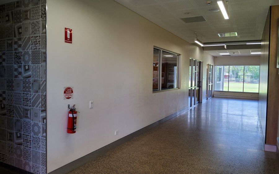 Hallway With a Textured Wall on the Left, Windows — EXPOSURE NORTH PLASTERING PTY LTD in Berry Springs, NT