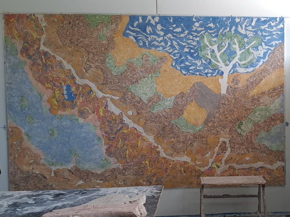 Mosaic Artwork Depicting a Landscape with A Tree, Mounted on A Wall Near a Gated Area — EXPOSURE NORTH PLASTERING PTY LTD in Berry Springs, NT