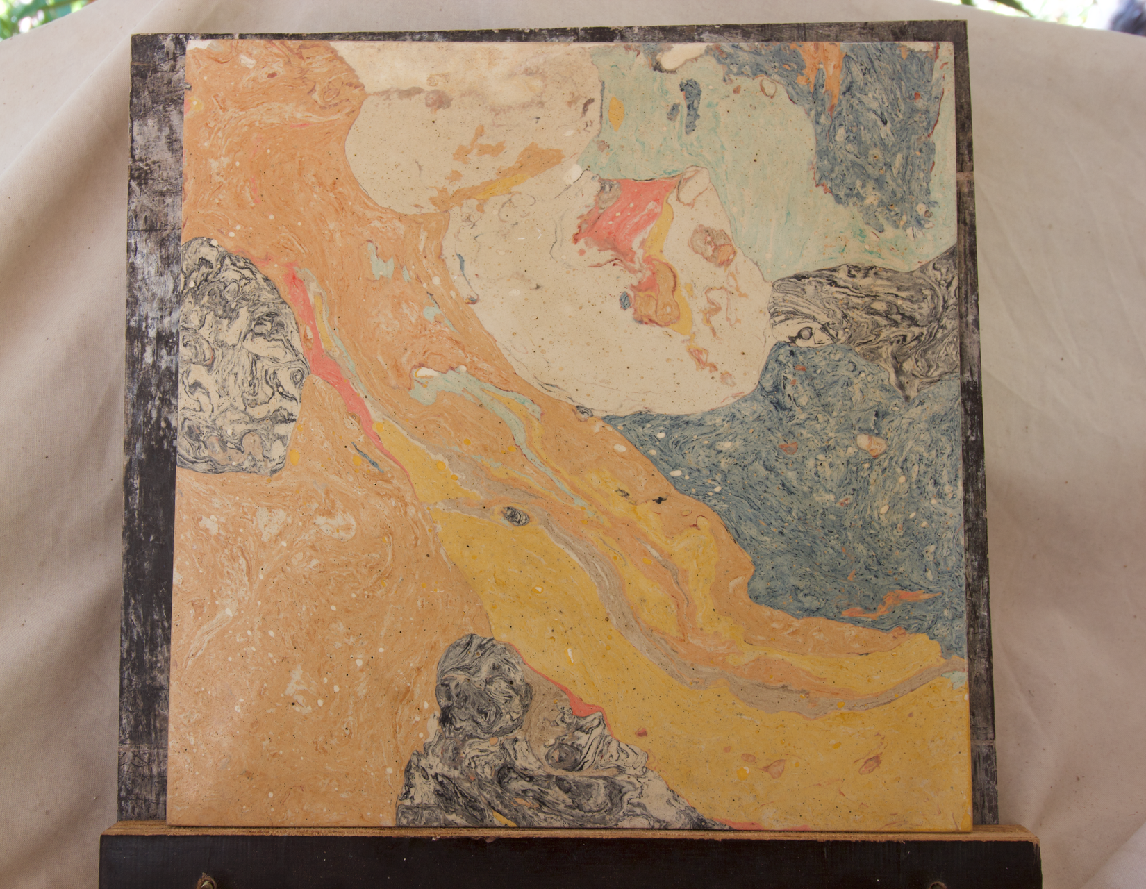 Abstract Art with Swirling Patterns of Orange, Yellow, Green, Pink, and Blue on A Square Surface — EXPOSURE NORTH PLASTERING PTY LTD in Berry Springs, NT