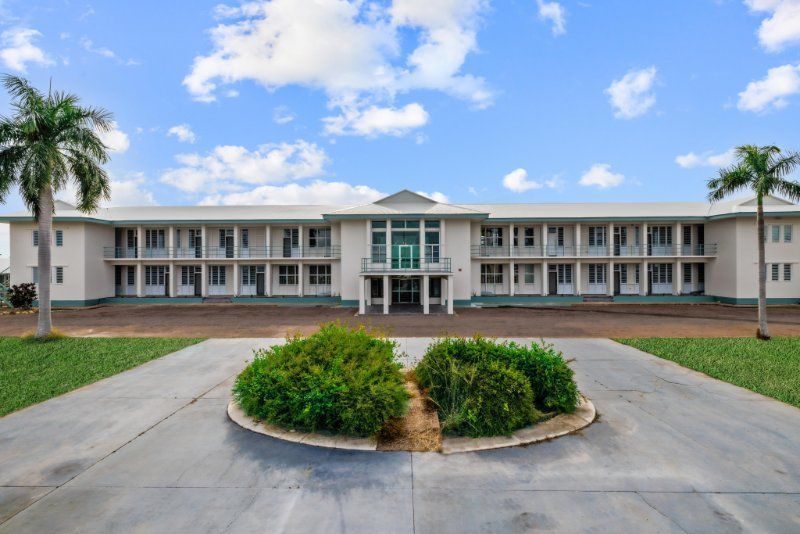 Two-Story White Building with Windows — EXPOSURE NORTH PLASTERING PTY LTD in Berry Springs, NT