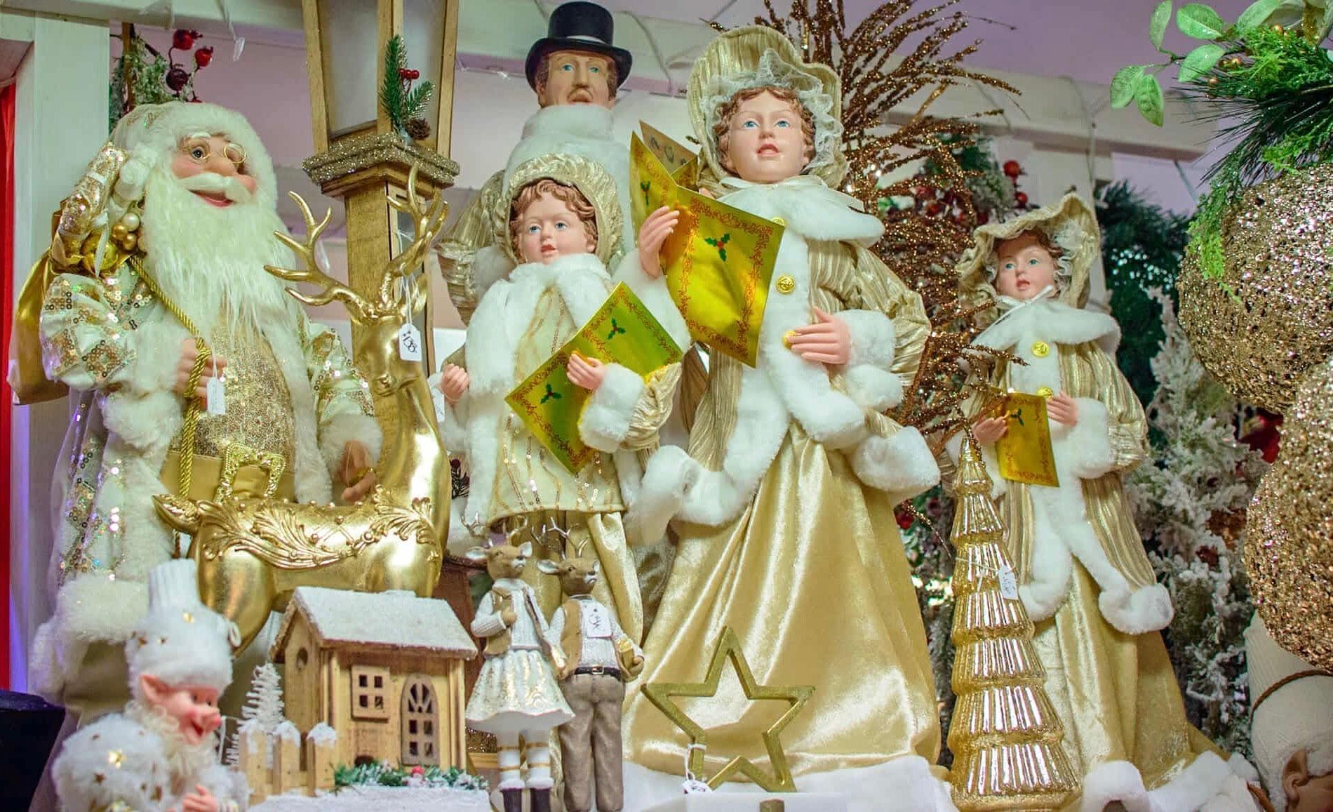 A group of christmas decorations are sitting on top of a table.
