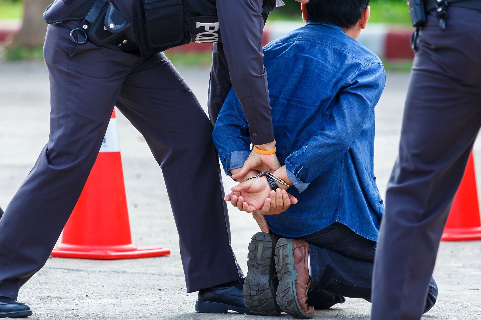 the man in blue coat got arrested