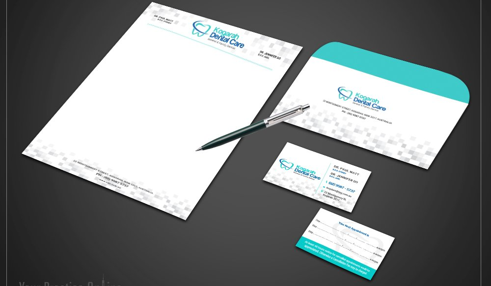 A pen is sitting on top of a piece of paper next to an envelope and a business card.