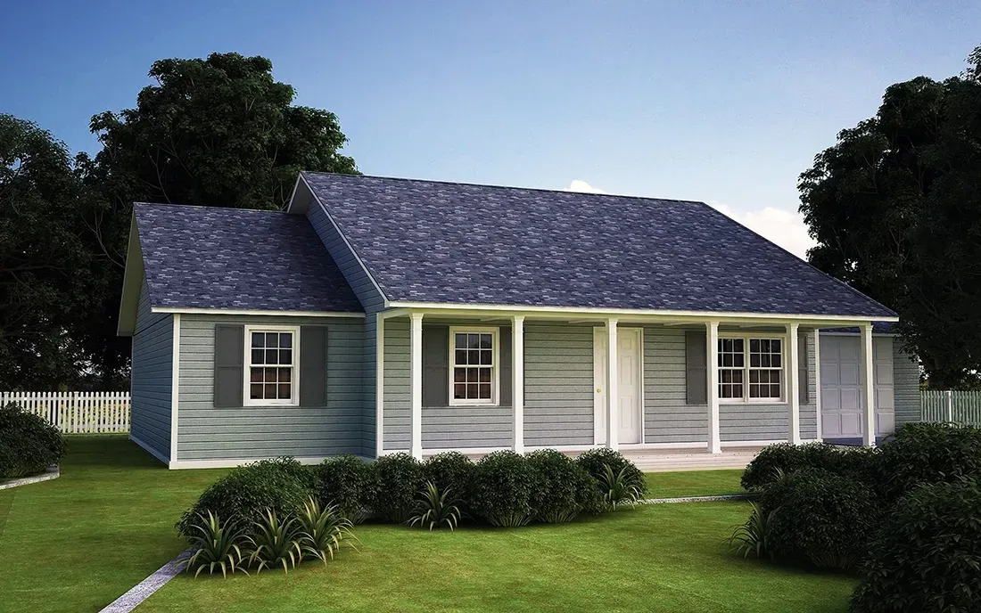 A single-story gray house with a dark blue shingled roof, white columns, and a porch, set in a green lawn with shrubs.