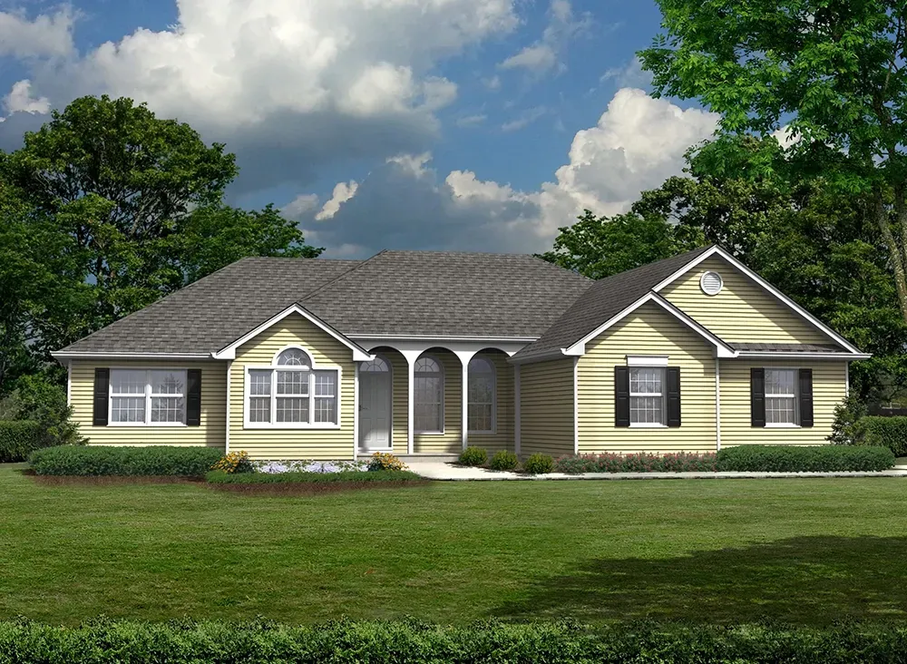 A single-story, light yellow suburban house with dark shutters, a gabled roof, and arched porch pillars on a grassy lawn.