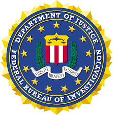 FBI seal with blue and gold ring, eagle crest, and Federal Bureau of Investigation text