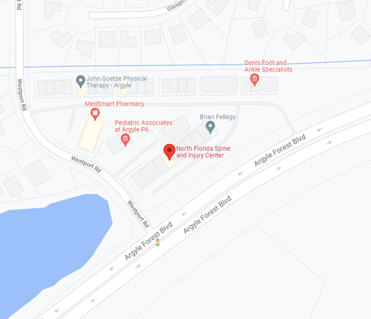 Map with several red location pins near a curved road and blue water in the lower left.
