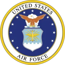 United States Air Force seal with eagle, shield, stars, and gold outer ring on a blue background