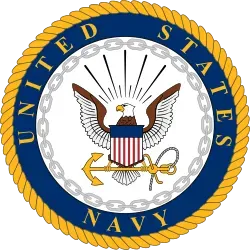 U.S. Navy seal with eagle, anchor, rope border, and blue-gold outer ring reading “United States Navy”