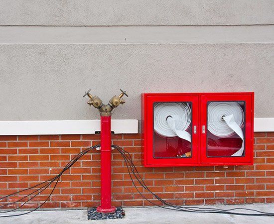 Water Hoses And Fire Extinguisher Equipment — Birmingham, AL — Automatic Fire Systems Water Hoses And Fire Extinguisher Equipment — Birmingham, AL — Automatic Fire Systems