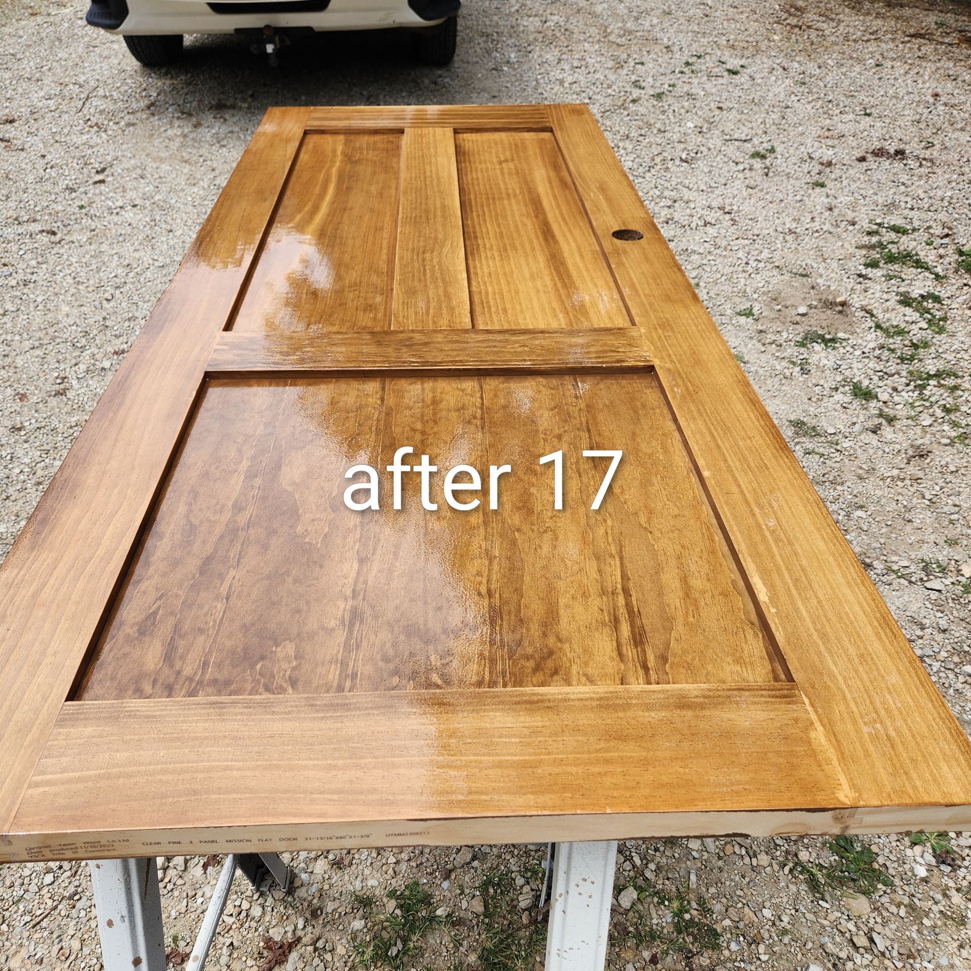 Wooden door panels drying outdoors on sawhorses, with “after 17” text overlay.