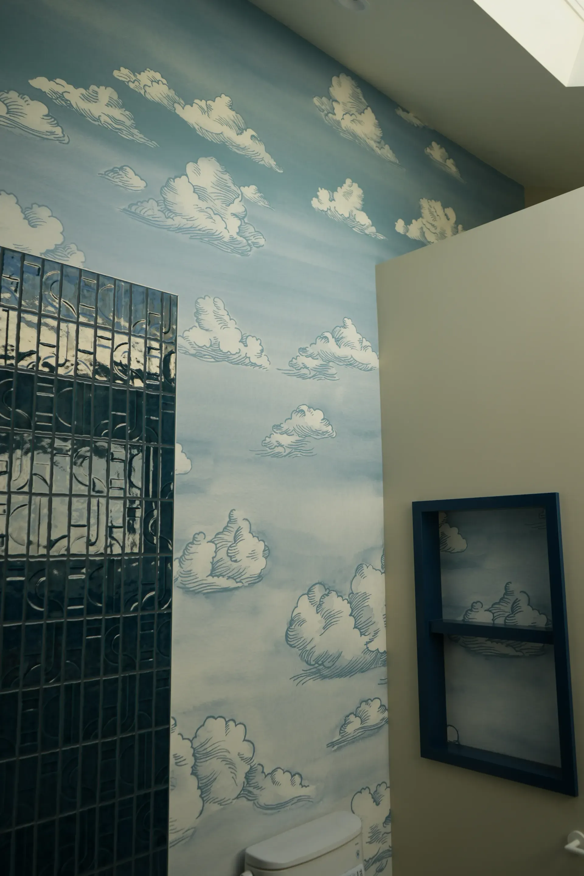 cloud wallpaper in bathroom