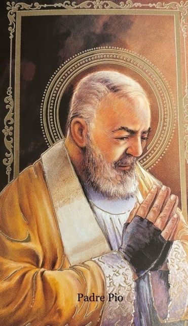 A painting of a man with a beard is titled padre pio