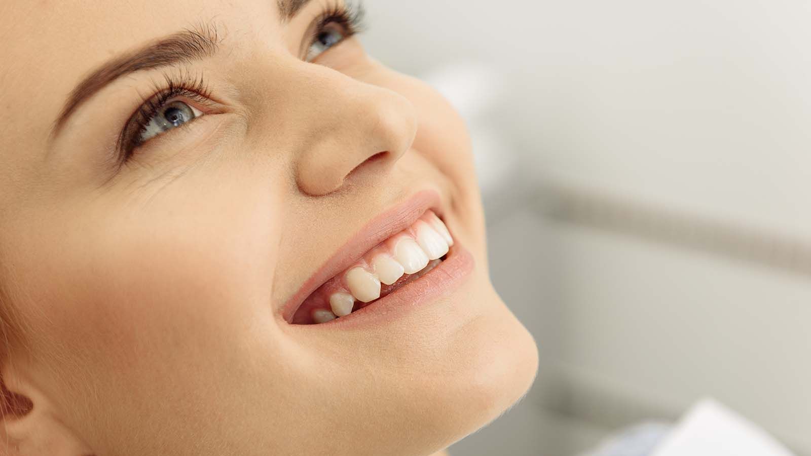 Dental patient with healthy smile. 