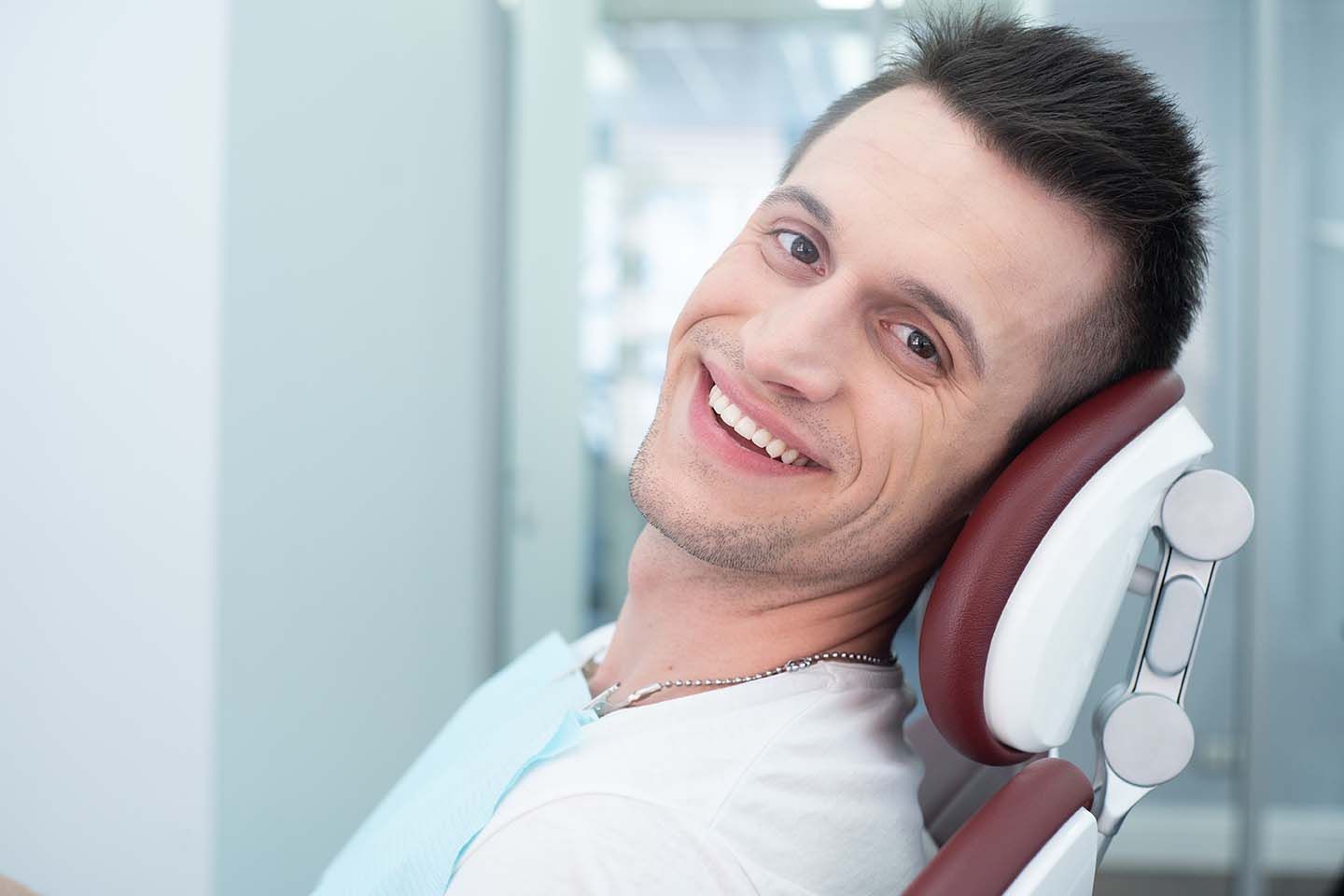 smiling dental patient at a dental office. Dr Colleen L. Catera DMD