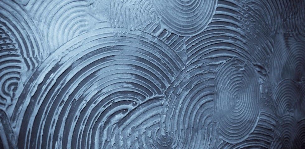Image showcasing Textured Paint vs Venetian Plaster: Which Finish is Right for Your Home?
