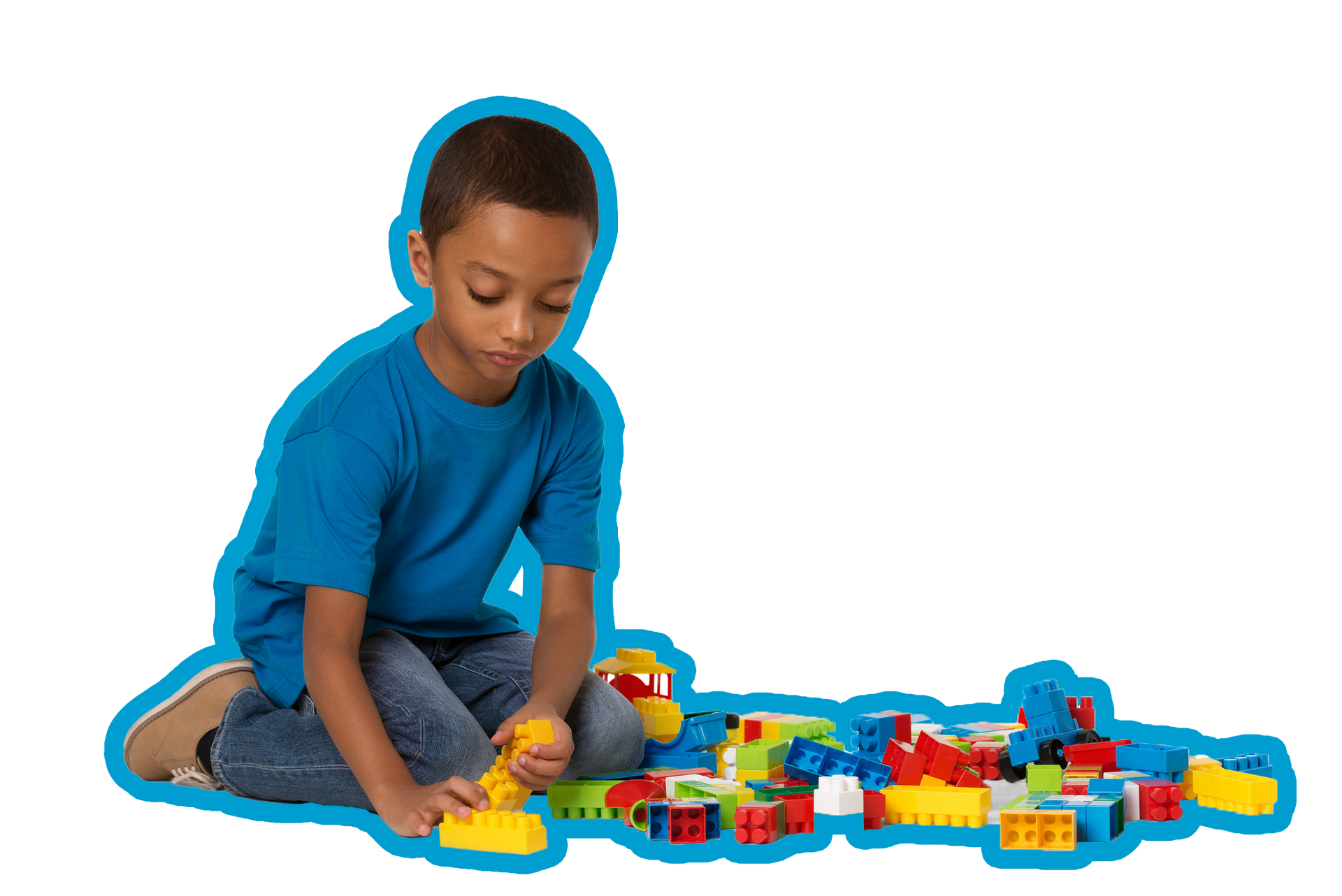 Boy in blue shirt and jeans playing with colorful building blocks. Boy in blue shirt and jeans playing with colorful building blocks.
