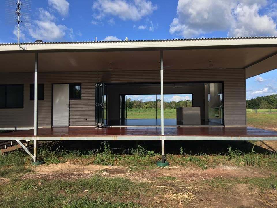 A House With a Large Porch and Sliding Glass Doors — SLS Builders Pty Ltd in Humpty Doo, NT