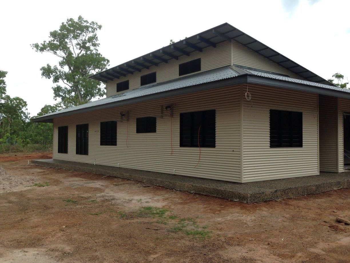 A White House With Black Windows and a Metal Roof — SLS Builders Pty Ltd in Humpty Doo, NT