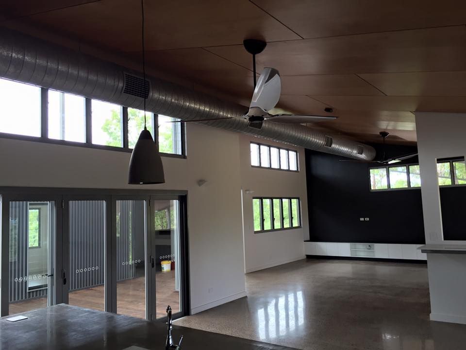 An Empty Room With a Ceiling Fan Hanging From the Ceiling — SLS Builders Pty Ltd in Humpty Doo, NT