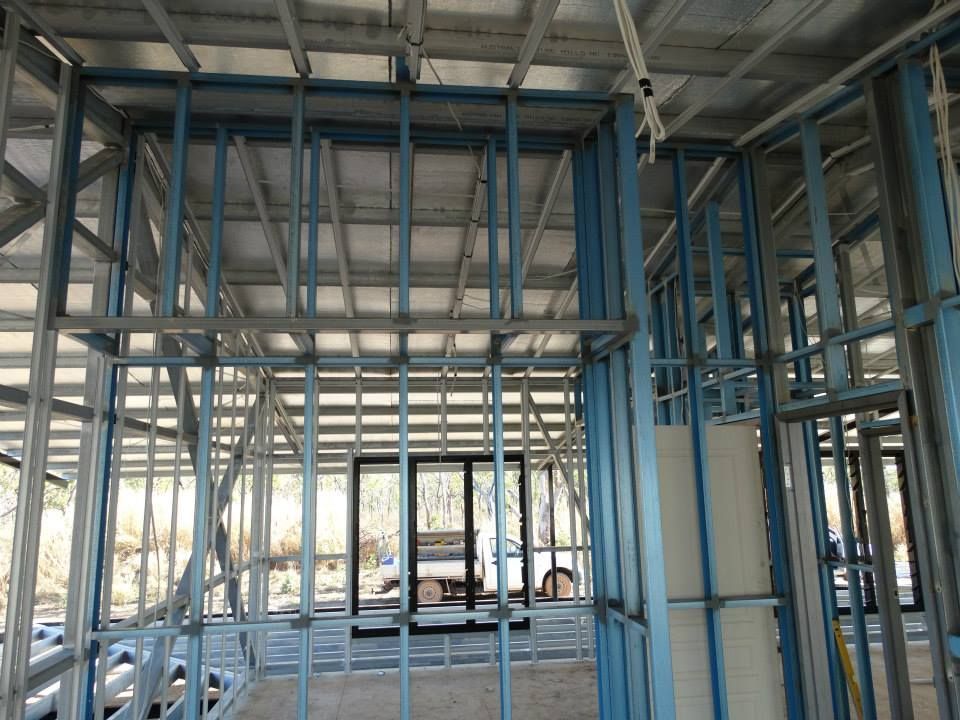 A Building Under Construction With A Lot Of Metal Frames — SLS Builders Pty Ltd in Humpty Doo, NT