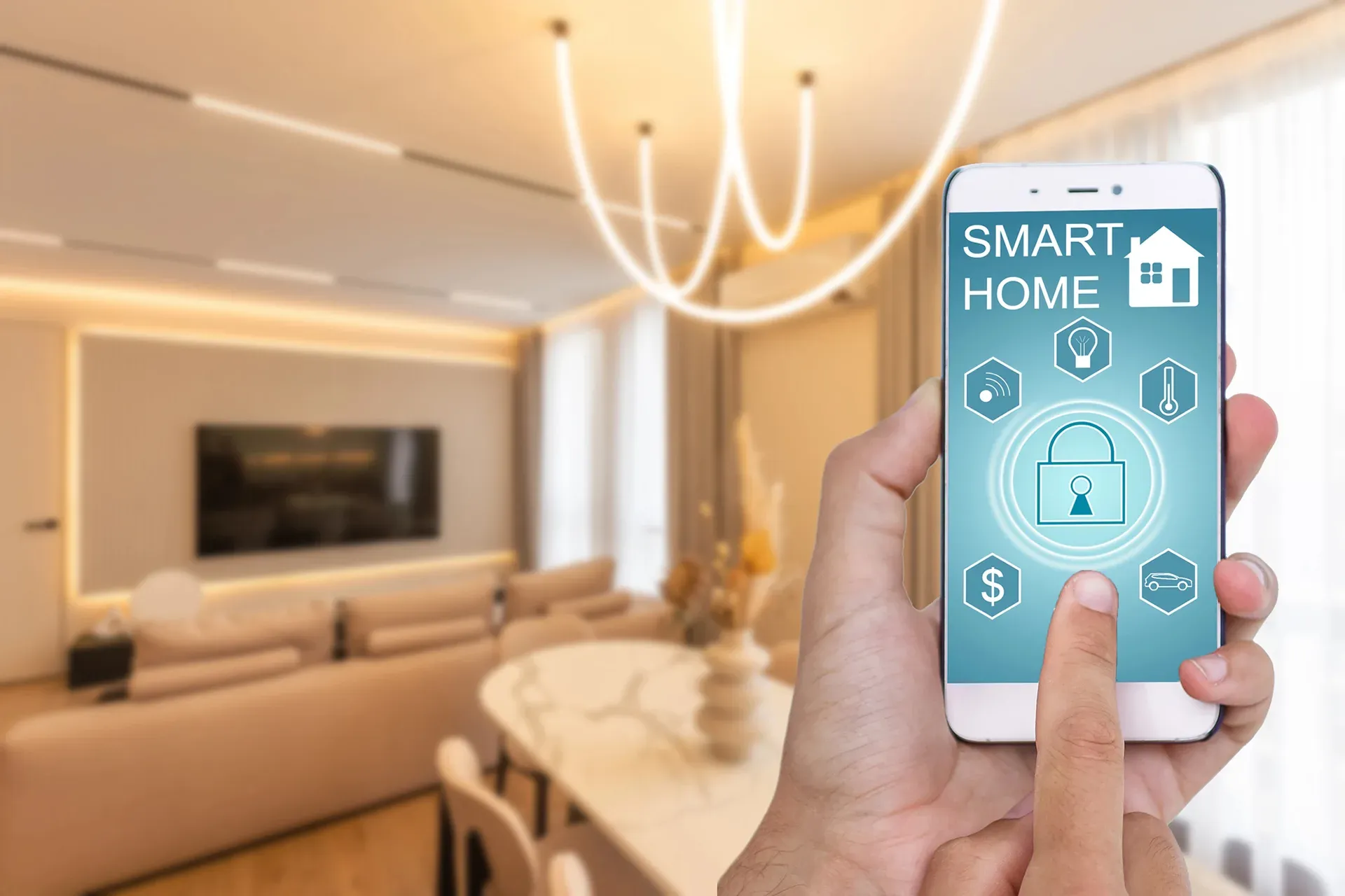 Person's hand using a smartphone with a smart home app open, controlling features in a living room.