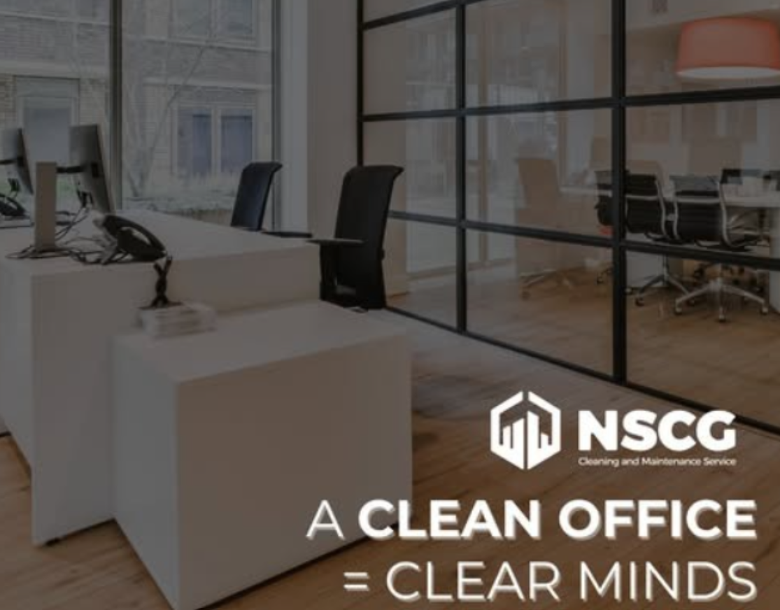 Empty modern office with white desks and chairs, overlaid text: “A CLEAN OFFICE = CLEAR MINDS” and NSCG logo. Empty modern office with white desks and chairs, overlaid text: “A CLEAN OFFICE = CLEAR MINDS” and NSCG logo.