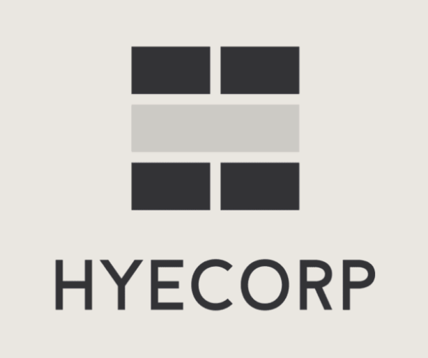 Logo for Hyecorp consisting of a square icon with four dark grey rectangles and a light grey bar above the text 