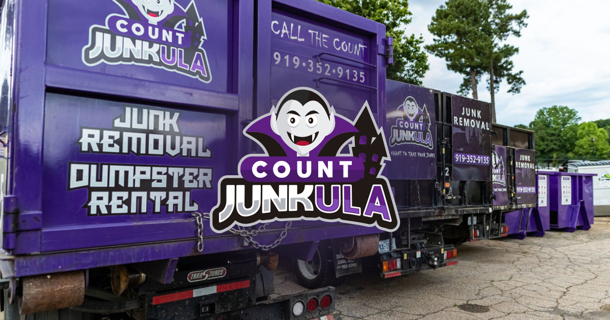 Purple Count Junkula junk removal truck with vampire mascot parked outdoors