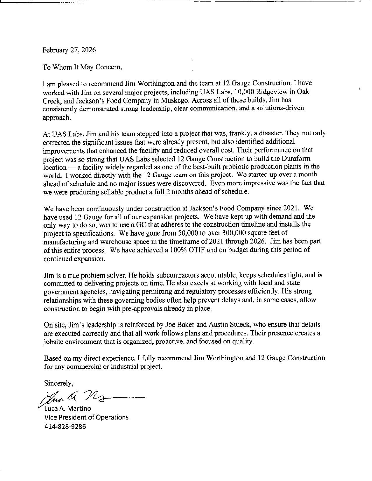 photo of a typed letter on white paper with a signature at the bottom.