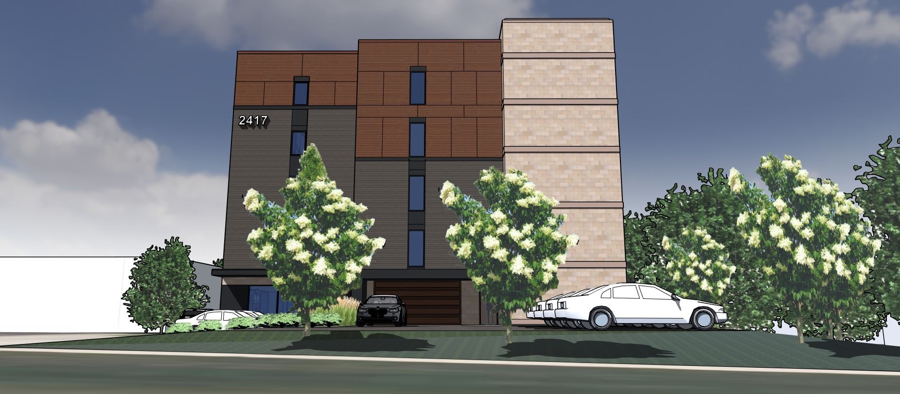 Modern building with trees and a car in front. Blue sky background.