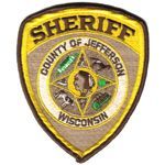 Jefferson County, Wisconsin Sheriff's Department patch with shield shape, gold, brown and white colors.