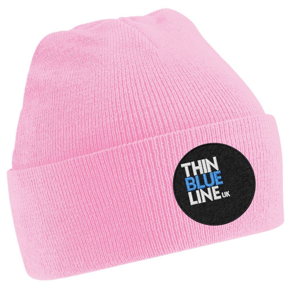 White beanie with a round patch: 