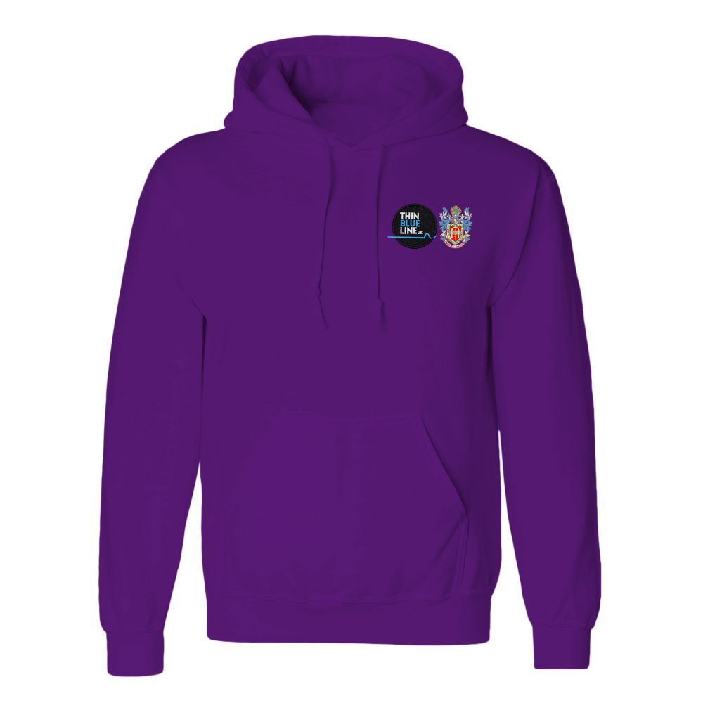 Royal blue hoodie with small emblems near the chest.