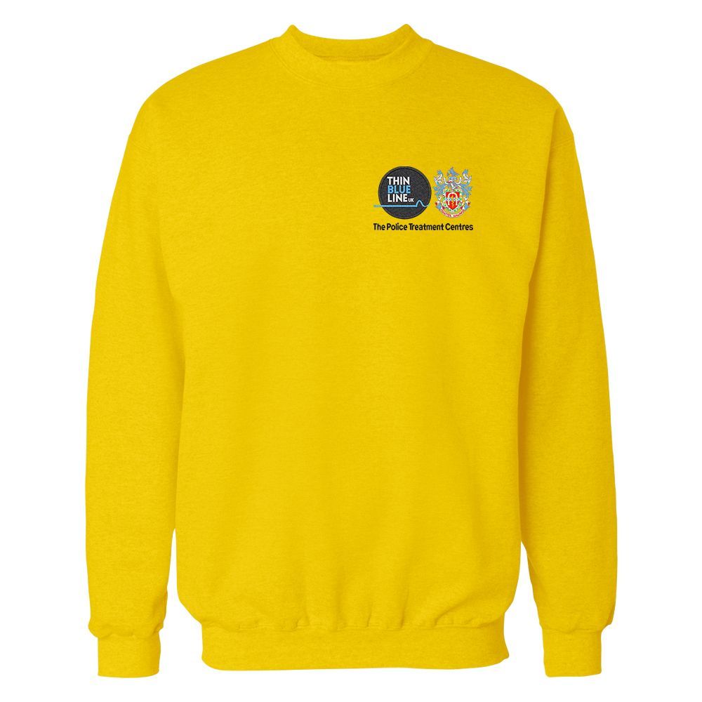 Yellow sweatshirt with logos for The Police Covenant on the chest.