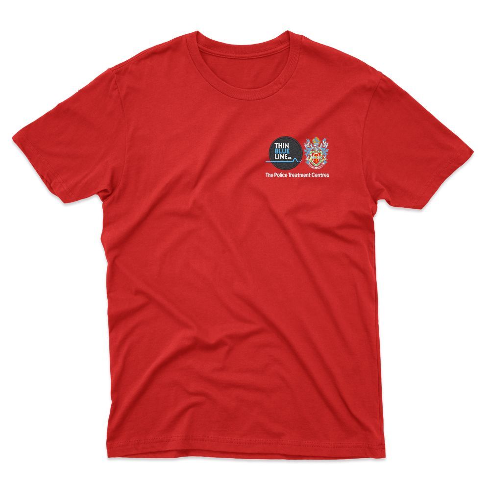 Red t-shirt with a small design on the left chest featuring a cartoon character and a colorful peace sign.