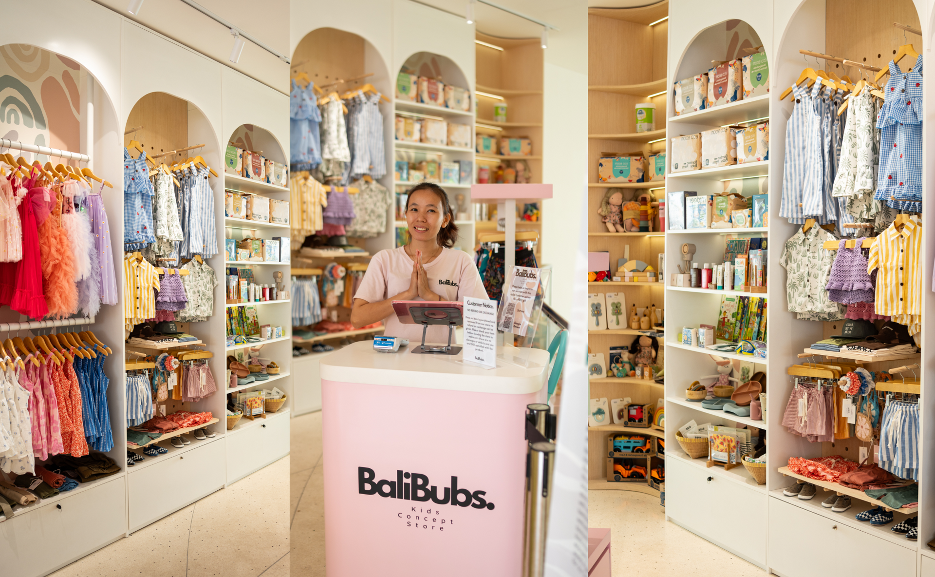 Boutique clothing shop with pastel shelves, hanging outfits, and a cashier at a pink counter