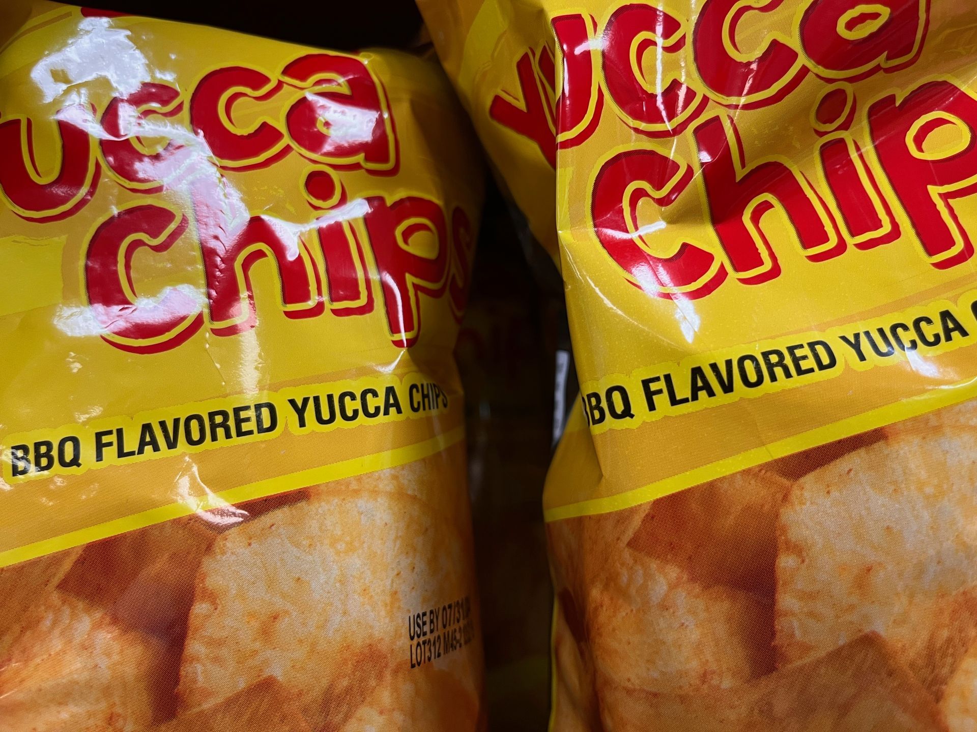 Two bags of yucca chips are sitting next to each other